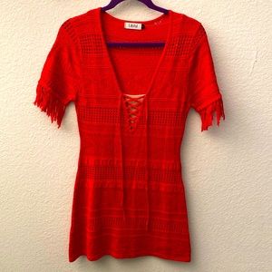 Never worn Red stretchy crochet dress with tan slip. Size large. Brand Lilyful.